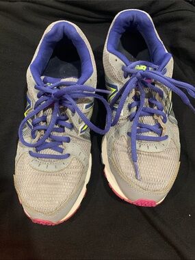 New Balance Gray Athletic Shoes with Purple Laces and Pink Soles